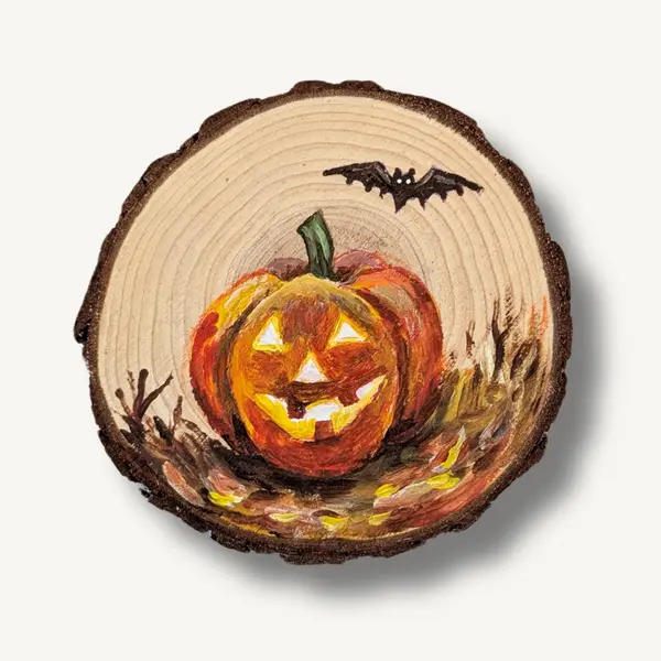 Handbemalte Holzscheibe mit einem Halloween Kürbis